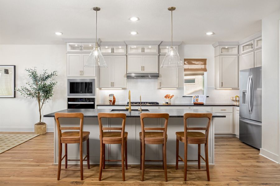 Furnished interior in a model home at Parmer Ranch in Georgetown (Image 30).