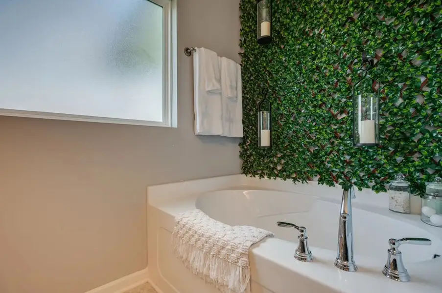 Relax after a long day in a luxury garden tub