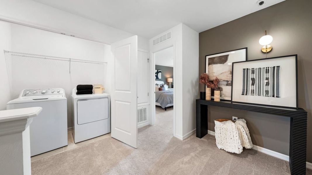 Furnished interior in a model home at The Towns at Skye Ranch in Sarasota (Image 29).