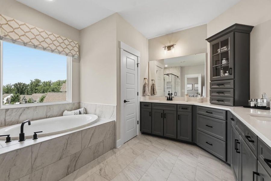 Furnished interior in a model home at Rock Creek in Denver (Image 40).
