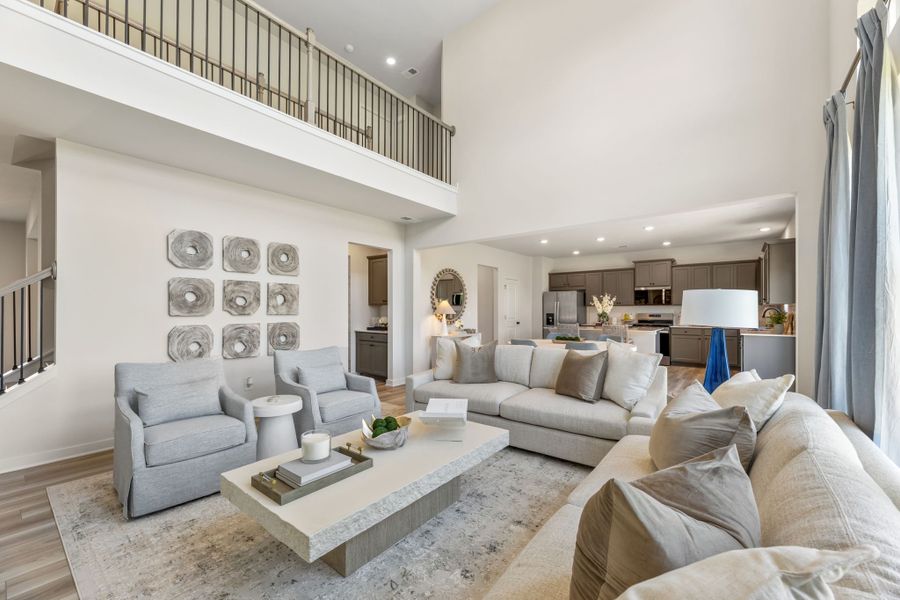 A living room with a couch and a table.