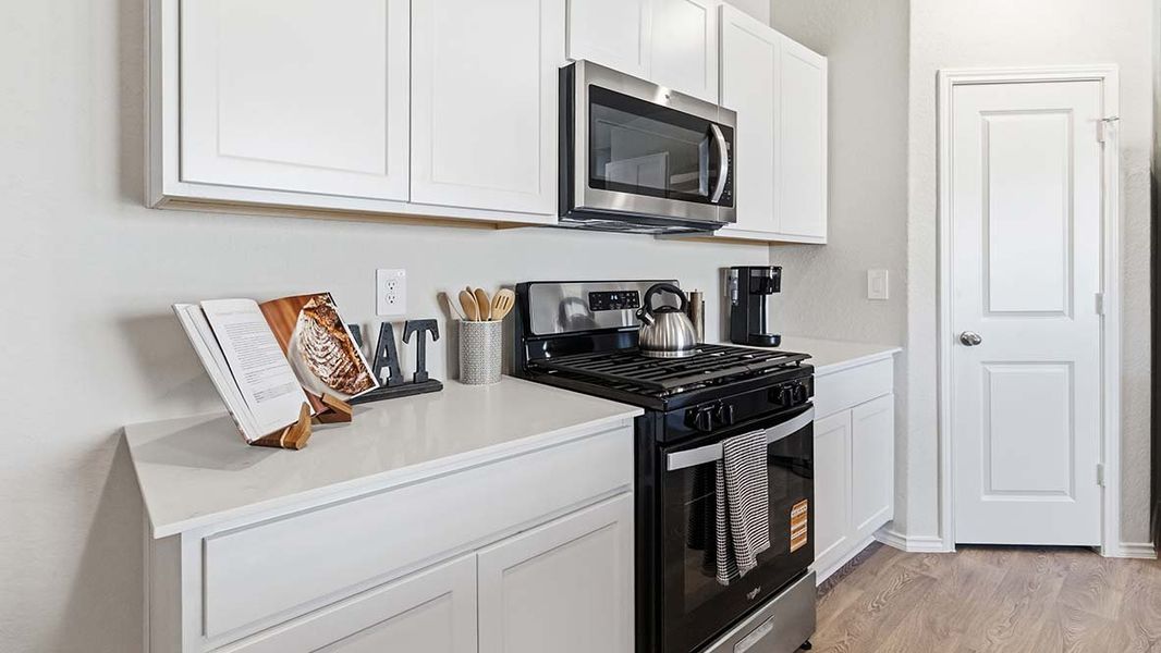 Furnished interior in a model home at Blue Ridge Ranch in San Antonio (Image 20).