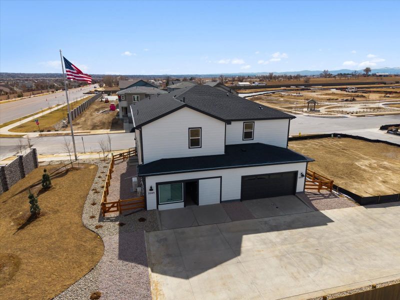 Front exterior of a home in the York Station community, located in Thornton, CO (Image 8).