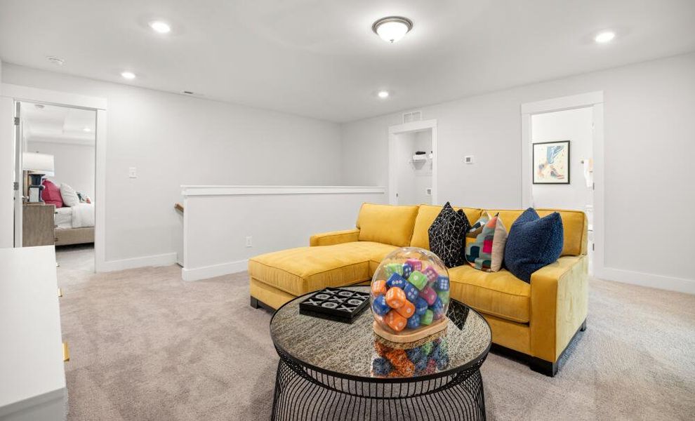 Furnished interior in a model home at Johnston Park Townhomes in Charlotte (Image 6). Furnished interior in a model home at Johnston Park Townhomes in Charlotte (Image 6).