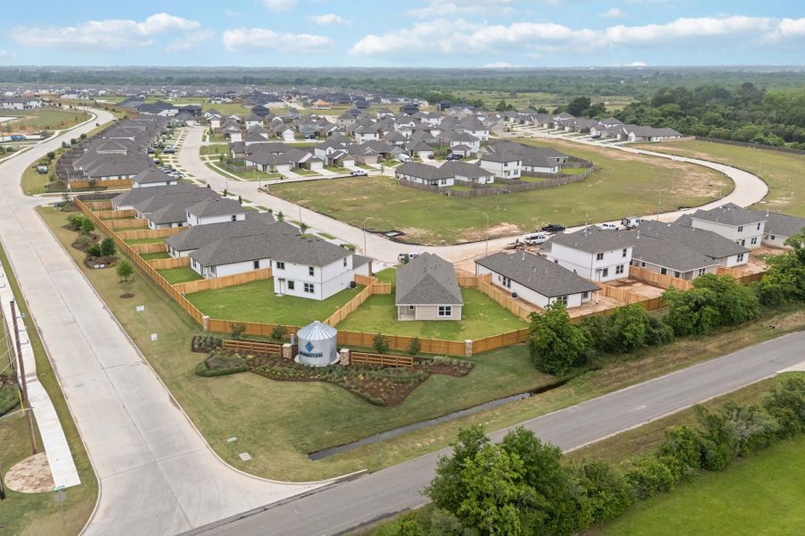 Aerial view of the Bluestem community in Brookshire, TX, showing layout and nearby surroundings (Image 14). Aerial view of the Bluestem community in Brookshire, TX, showing layout and nearby surroundings (Image 14).