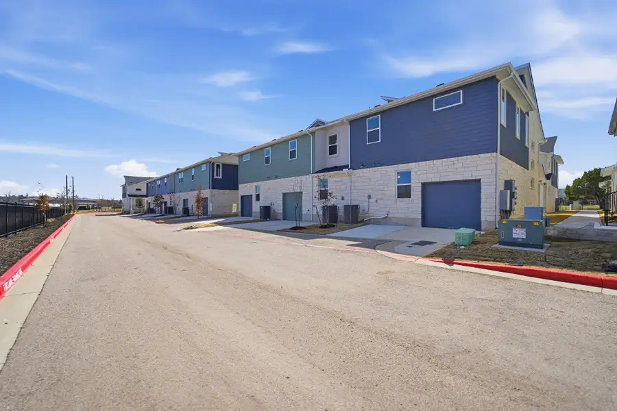 Exterior details of a home in Municipal Drive Townhomes, Leander (Image 4).