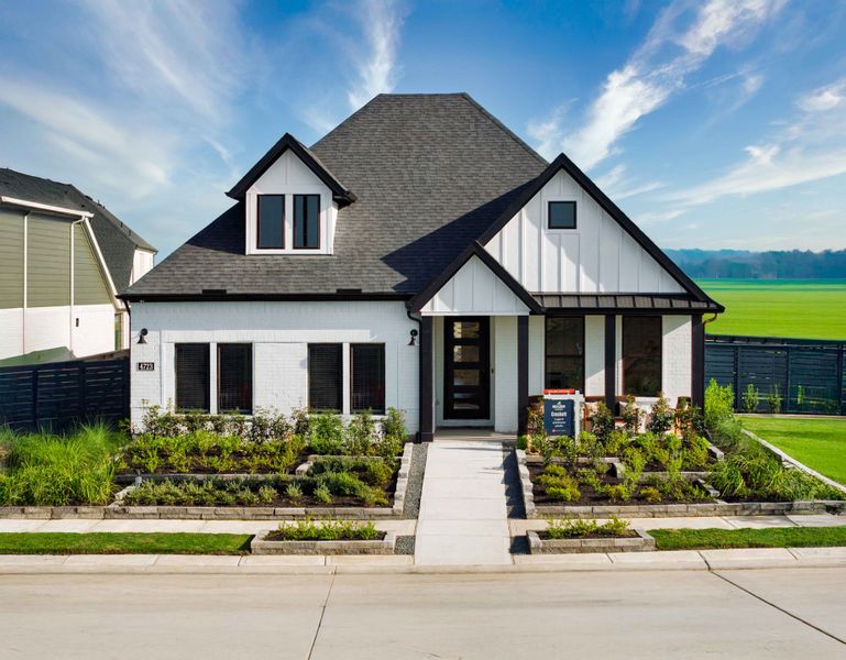 Front exterior of a home in the Austin Point: Heritage Collection community, located in Richmond, TX (Image 2).