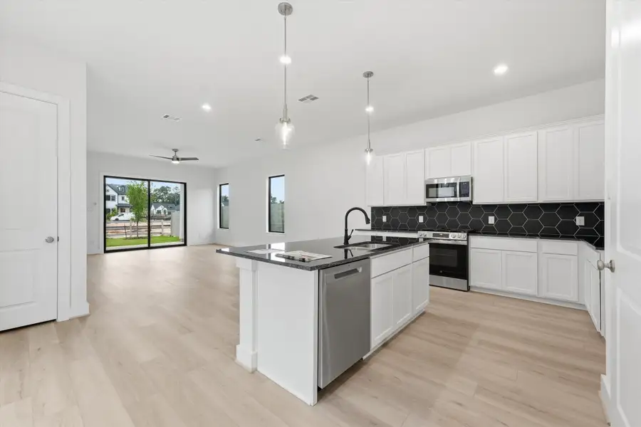 Furnished interior in a model home at Symphony in Montgomery (Image 31).