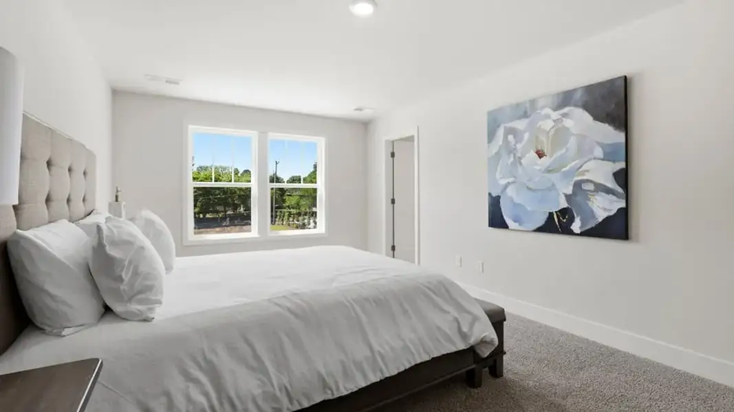 Furnished interior in a model home at Ashmore Hills in Mauldin (Image 28).