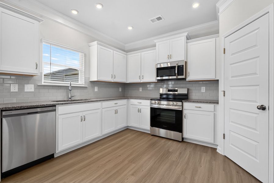 Furnished interior in a model home at Highland Crossing in Cartersville (Image 8).