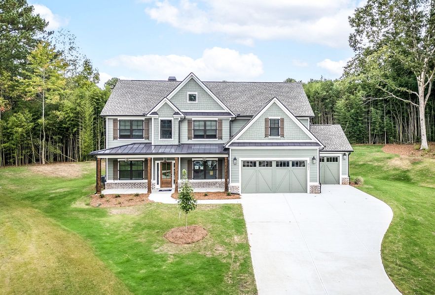 Front exterior of a home in the Spring Creek community, located in Monroe, GA (Image 11). Front exterior of a home in the Spring Creek community, located in Monroe, GA (Image 11).