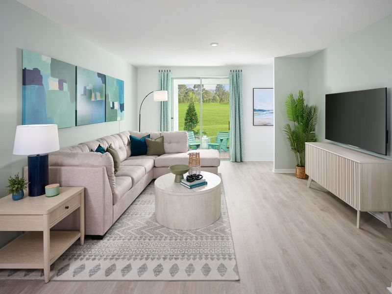 Living room in the Everglade floorplan modeled at Hamilton Bluff