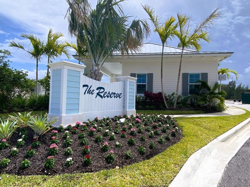 Entrance to the The Reserve at Tequesta community in Tequesta, FL, featuring signage and landscaping (Image 2). Entrance to the The Reserve at Tequesta community in Tequesta, FL, featuring signage and landscaping (Image 2).