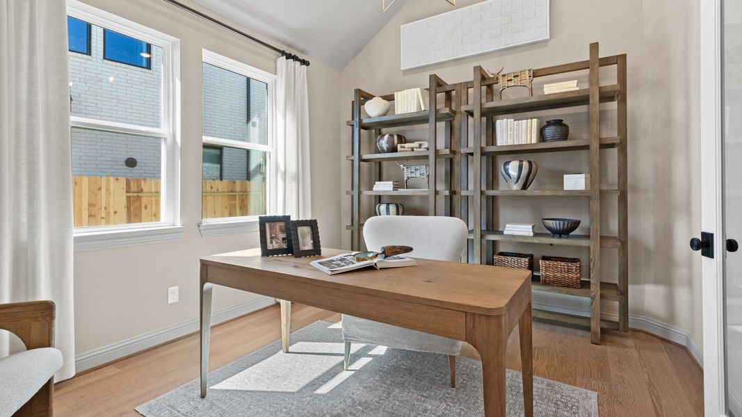 Furnished interior in a model home at Wildrye in Waller (Image 29).