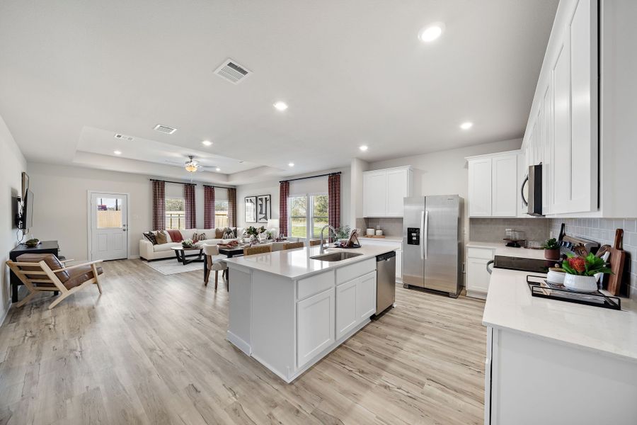 A kitchen with white cabinets. A kitchen with white cabinets.