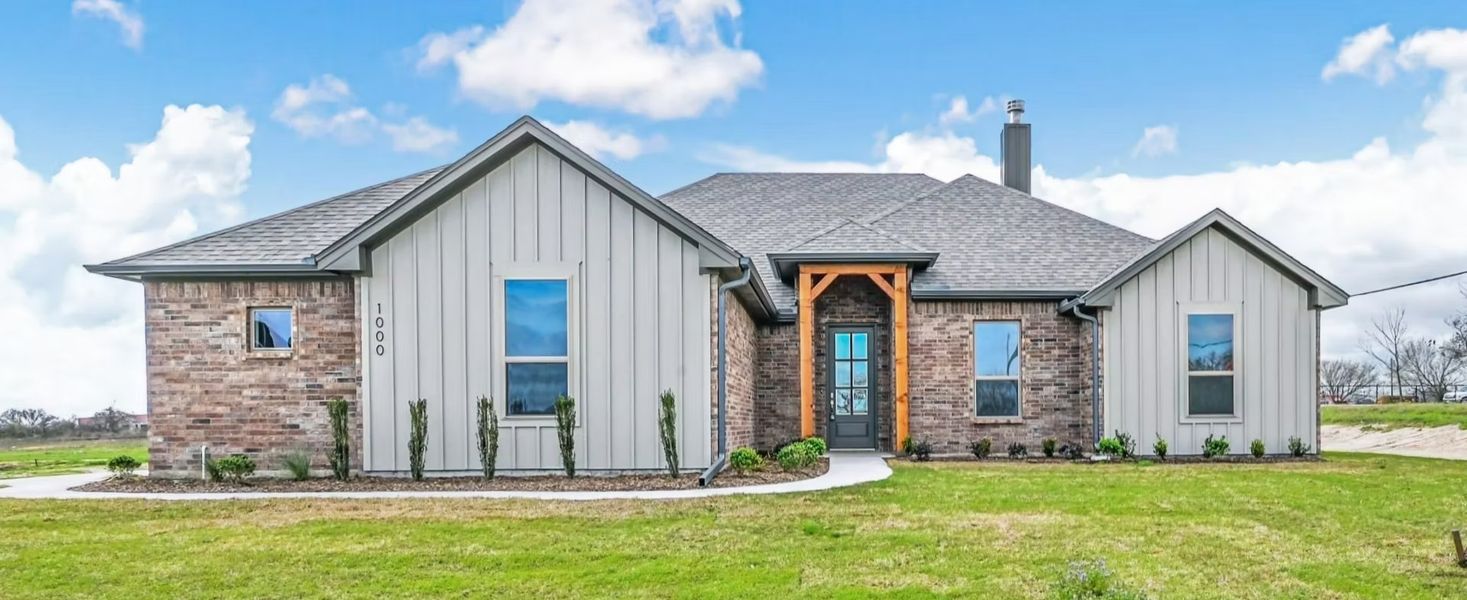 Front exterior of a home in the Arbor Oaks community, located in Boyd, TX (Image 1).