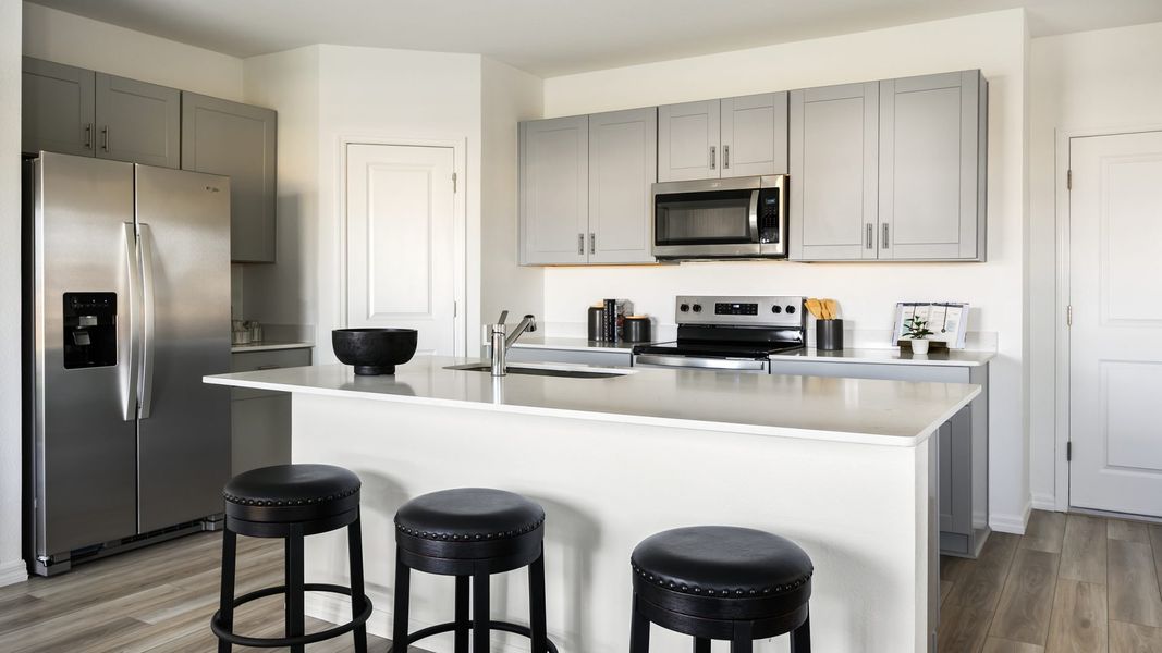 Furnished interior in a model home at Bellehaven in Belleview (Image 4).