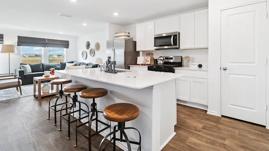 Furnished interior in a model home at Blue Ridge Ranch in San Antonio (Image 7).