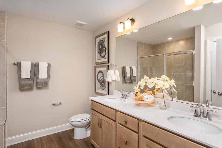 Furnished interior in a model home at Running Brook Townes in Durham (Image 12).