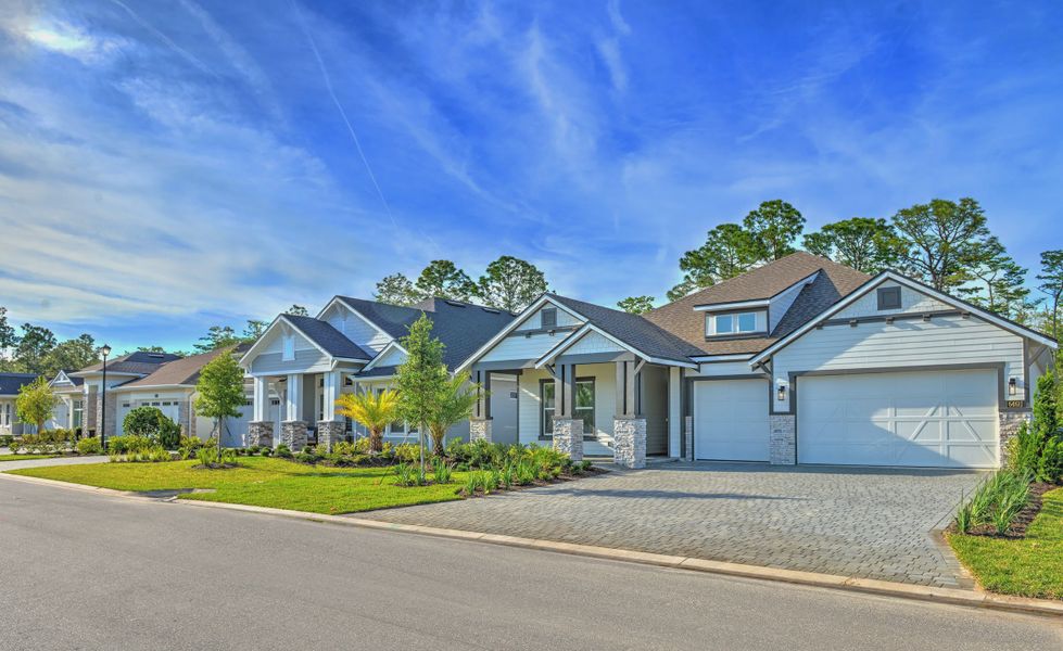 Front exterior of a home in the Woodhaven Single Family community, located in Port Orange, FL (Image 16). Front exterior of a home in the Woodhaven Single Family community, located in Port Orange, FL (Image 16).
