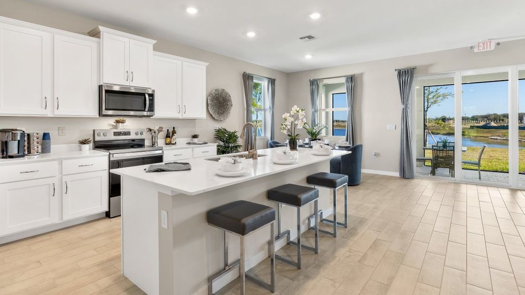 Furnished interior in a model home at Cove at West Port - Tradition in Port Charlotte (Image 36).