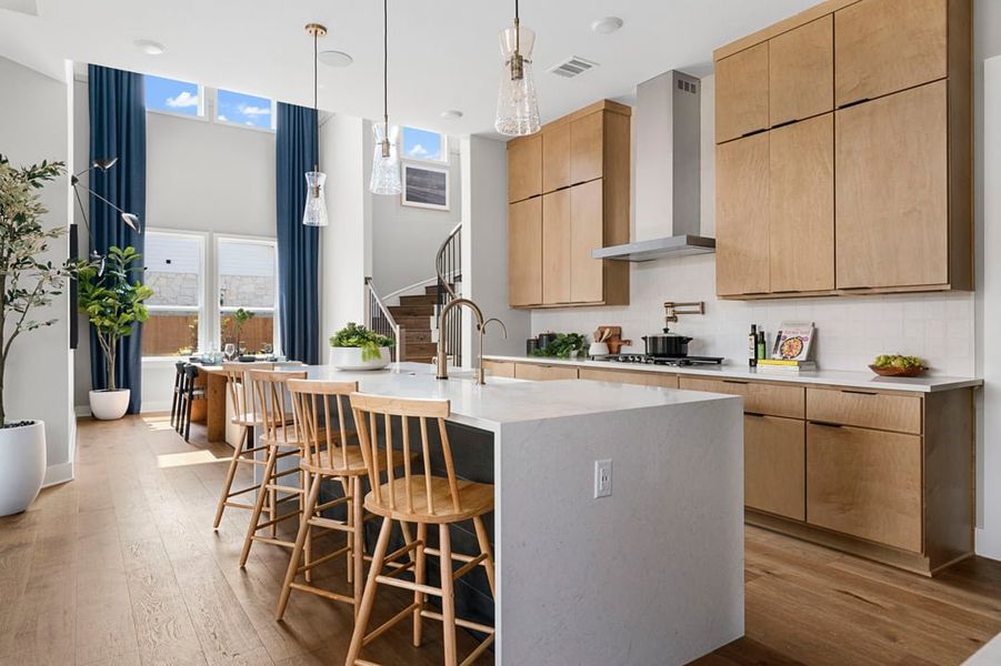 Furnished interior in a model home at Heritage in Dripping Springs (Image 6).
