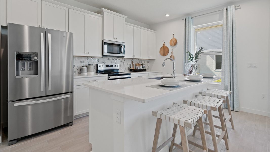 Trinity Place Staged Model Ambersweet Kitchen by DRB Homes in Saint Cloud FL Trinity Place Staged Model Ambersweet Kitchen by DRB Homes in Saint Cloud FL