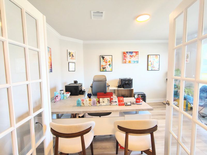 Furnished interior in a model home at Greystone in Angleton (Image 8).