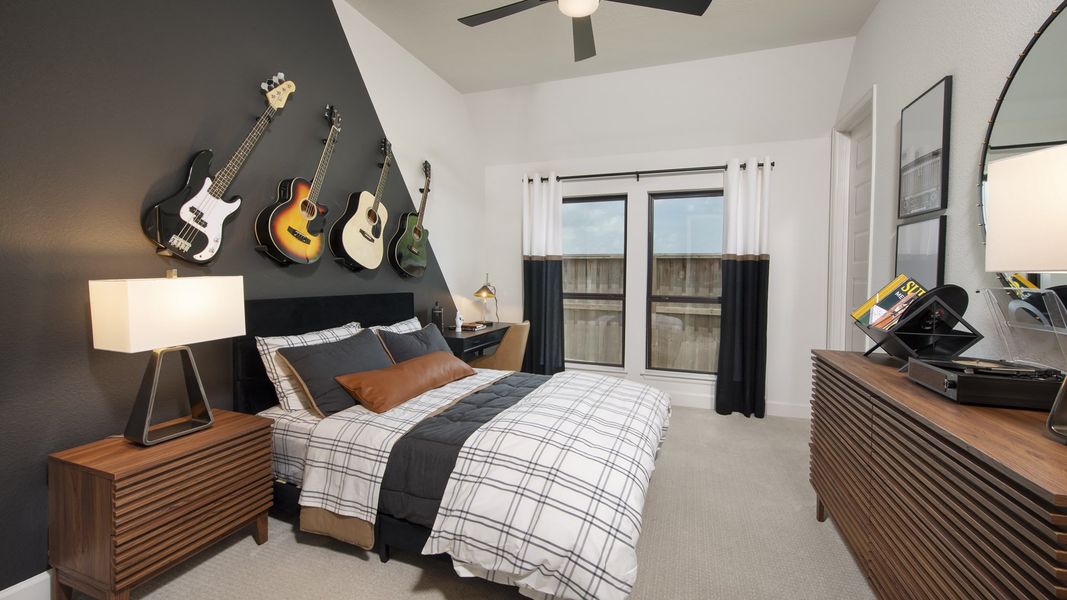 Furnished interior in a model home at Riceland 70' in Mont Belvieu (Image 20).