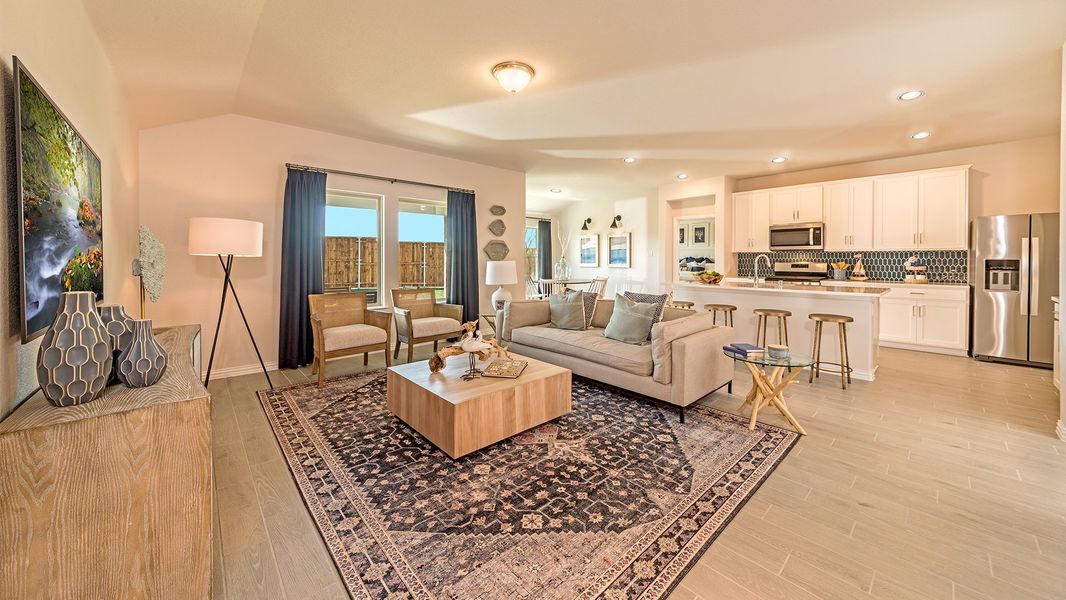 Furnished interior in a model home at Lake Pointe in Little Elm (Image 14).