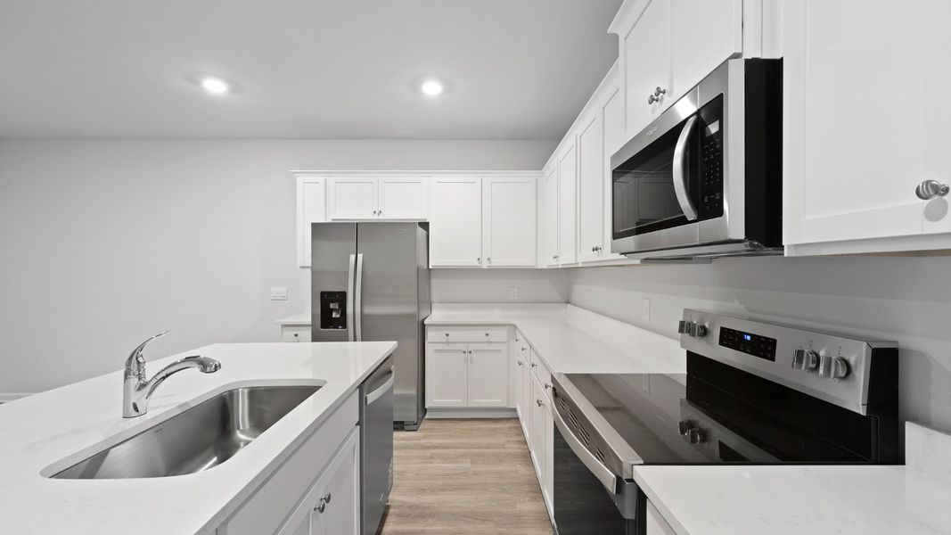 Furnished interior in a model home at Garbon Fields in Summerville (Image 11).
