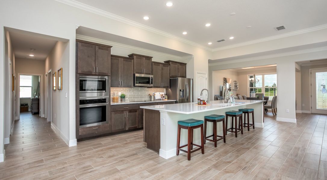 Furnished interior in a model home at Graceland Estates in Thonotosassa (Image 4).
