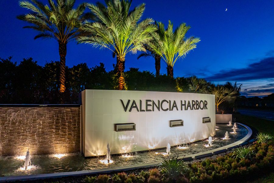 Entrance to the Valencia Harbor (55+) community in Fort Myers, FL, featuring signage and landscaping (Image 9).