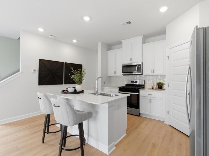 Furnished interior in a model home at Crossing at Abner Creek Townes in Greer (Image 7). Furnished interior in a model home at Crossing at Abner Creek Townes in Greer (Image 7).