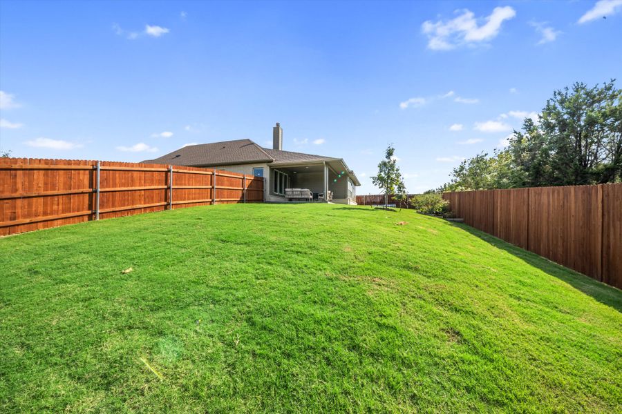 Front exterior of a home in the Waterford Park community, located in Weatherford, TX (Image 8).
