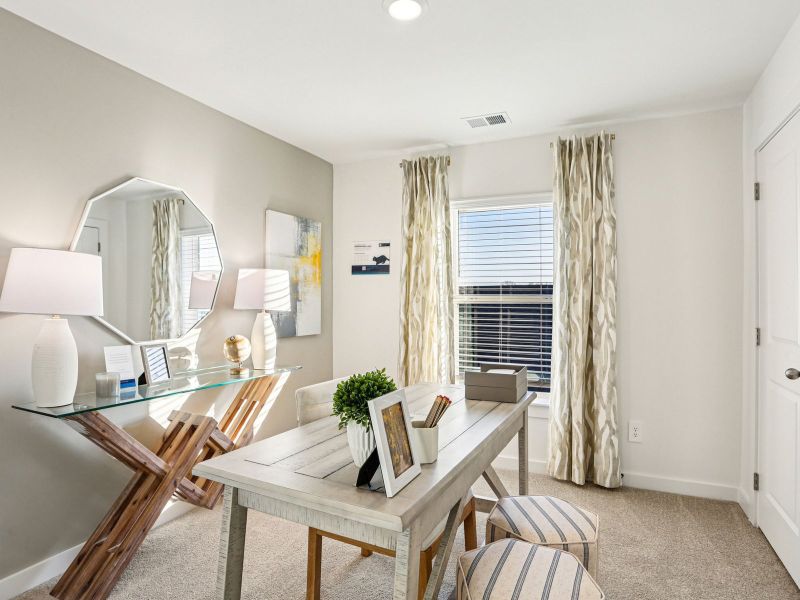 Furnished interior in a model home at Greystone - Vista Townhomes in Smyrna (Image 8).
