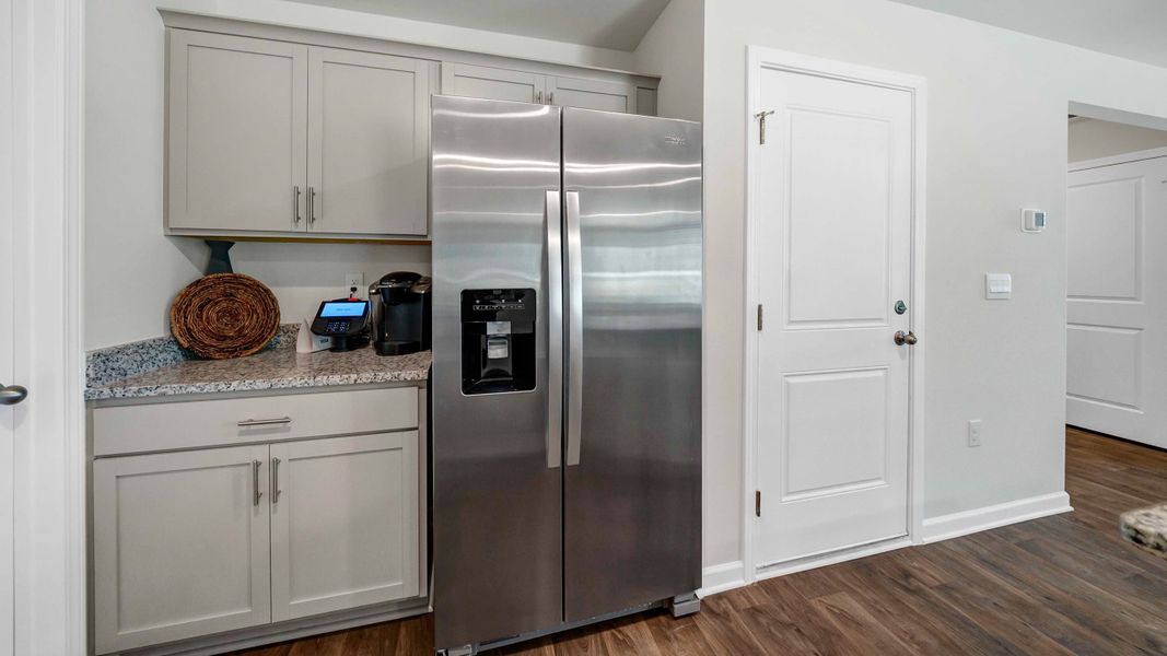 Furnished interior in a model home at South Haven in Camden (Image 11).