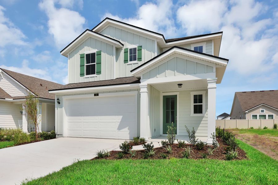 Front exterior of a home in the Mariposa at EverRange community, located in Jacksonville, FL (Image 9).