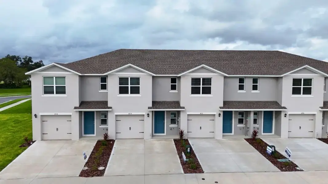 Front exterior of a home in the Annabelle Estates Townhomes community, located in Lake Wales, FL (Image 1). Front exterior of a home in the Annabelle Estates Townhomes community, located in Lake Wales, FL (Image 1).