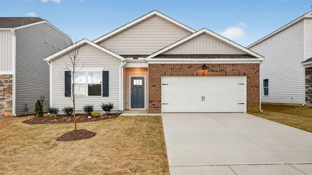 Front exterior of a home in the Galvins Ridge community, located in Sanford, NC (Image 3). Front exterior of a home in the Galvins Ridge community, located in Sanford, NC (Image 3).