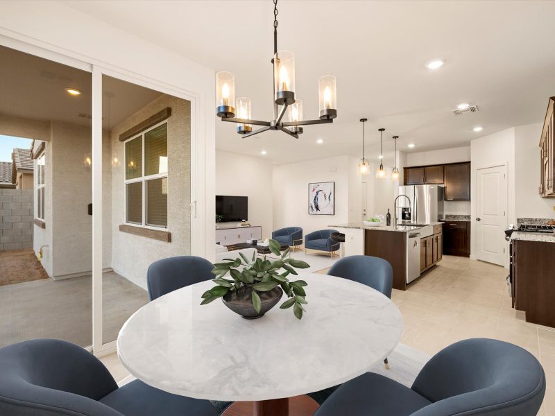 Furnished interior in a model home at Entrada Estate Series in Tolleson (Image 8).