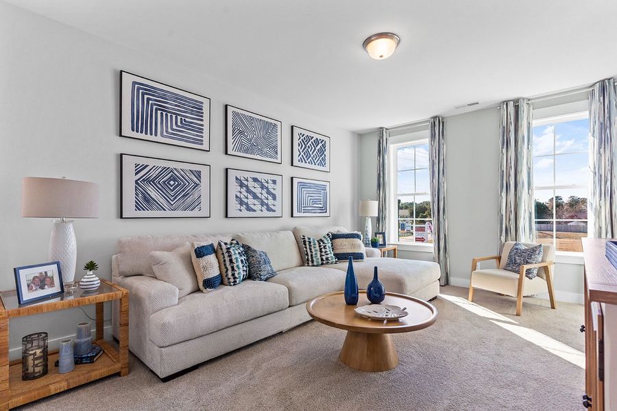 Furnished interior in a model home at WyndWater in Hampstead (Image 35).