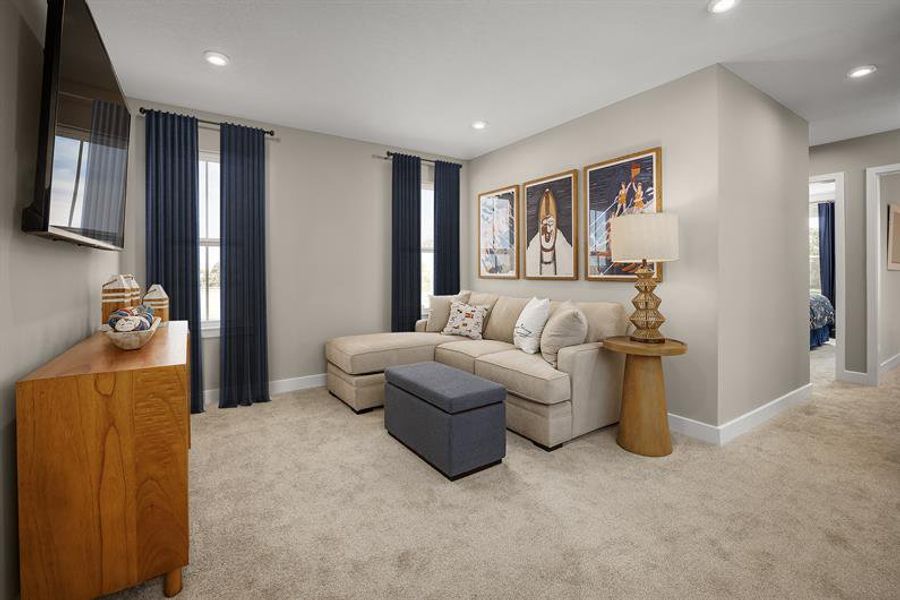 Furnished interior in a model home at Lake Mattie Preserve Townhomes in Auburndale (Image 5).