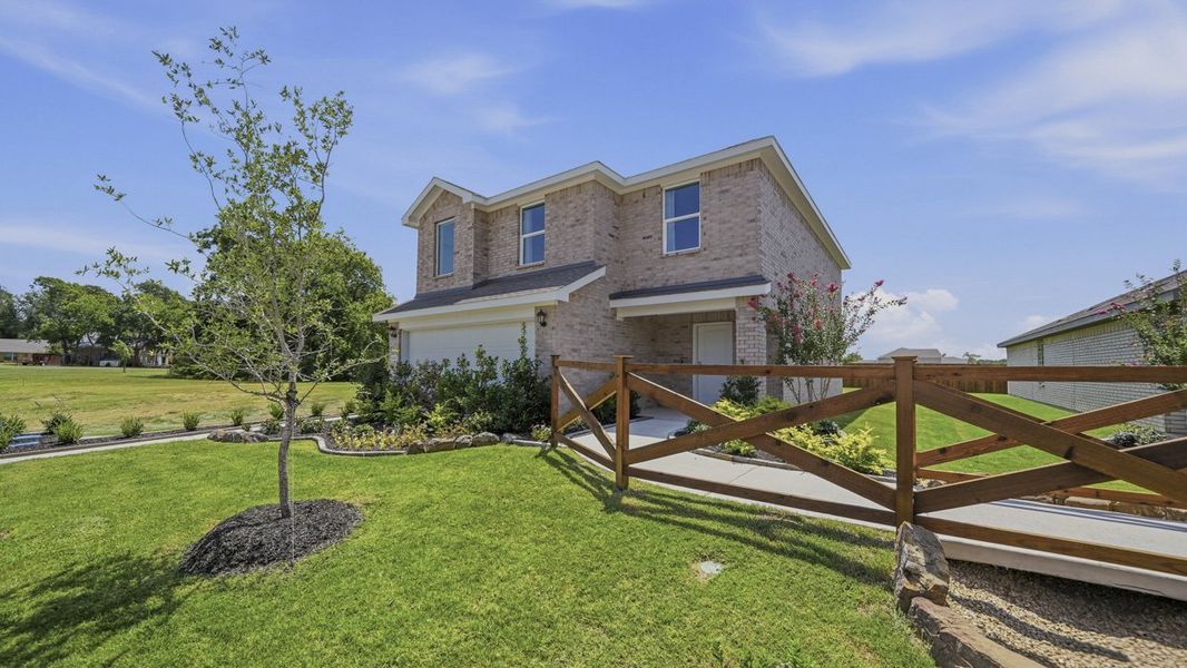 Front exterior of a home in the Asher Oaks community, located in Bonham, TX (Image 11). Front exterior of a home in the Asher Oaks community, located in Bonham, TX (Image 11).