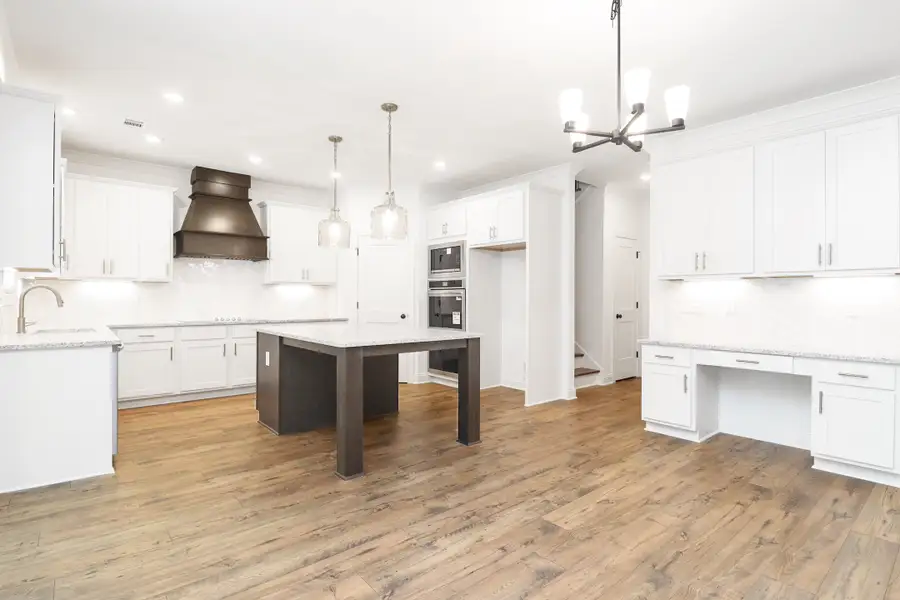 Furnished interior in a model home at Ella Springs in Covington (Image 3).
