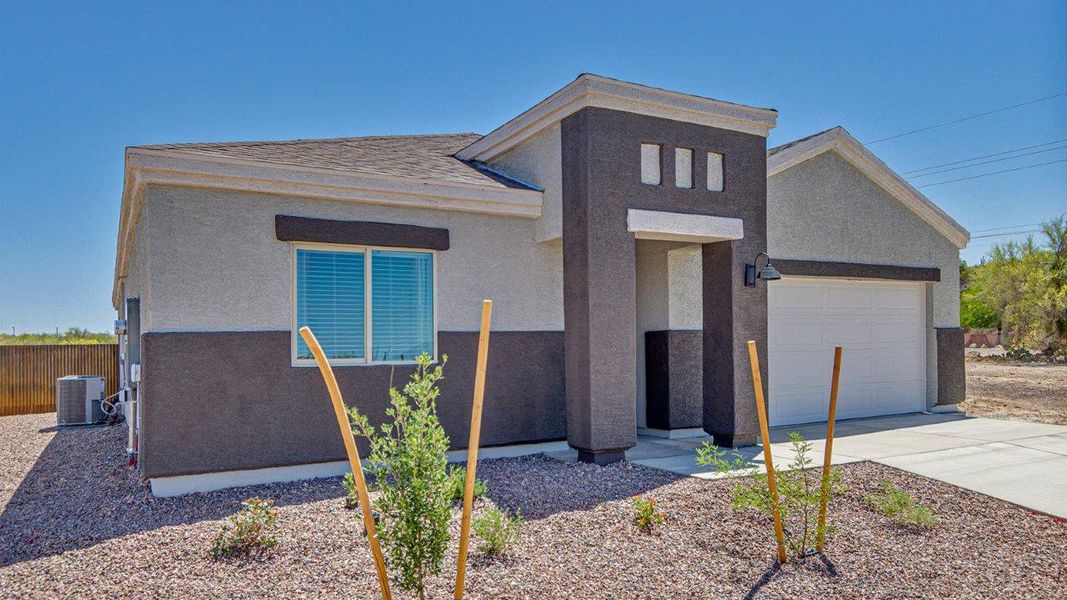 Front exterior of a home in the Roadrunner Estates community, located in Tucson, AZ (Image 5).