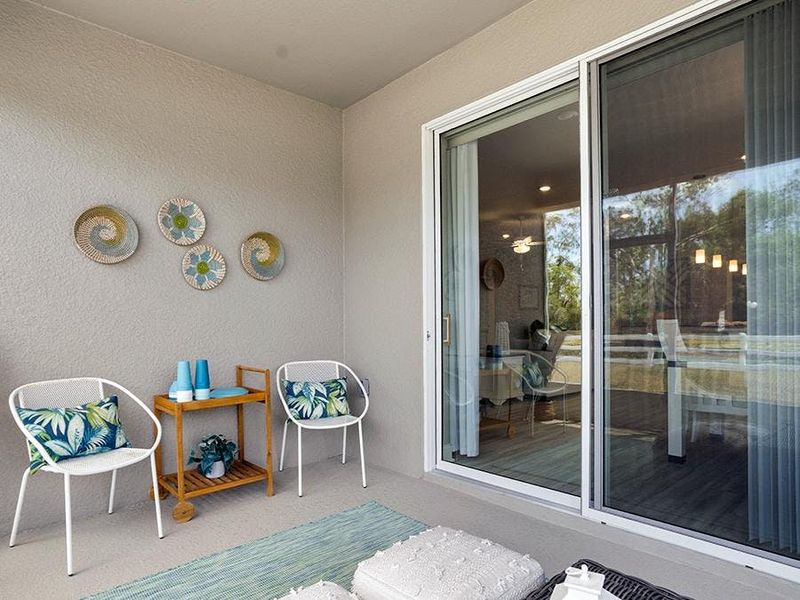 Your living space extends outdoors to your covered lanai - Shelby model home in Lake Alfred, FL
