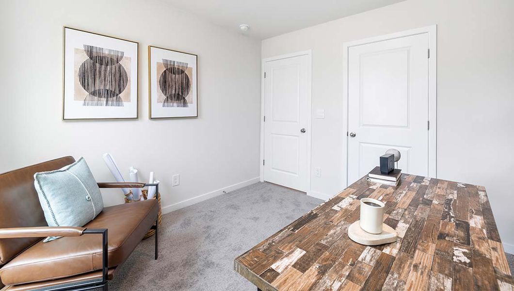 Furnished interior in a model home at Cardinal Creek in Charlotte (Image 37).