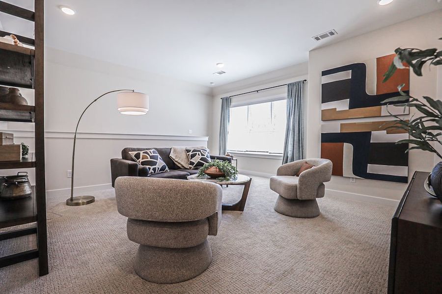 Furnished interior in a model home at Walker Farms in Bartlett (Image 47).