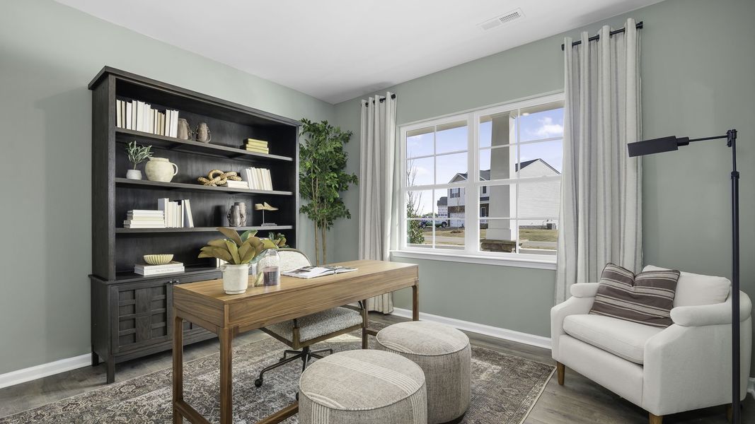 Furnished interior in a model home at Aurora Acres in Snow Camp (Image 3).